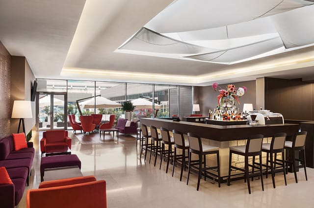 Ramada Plaza Bucharest flexible event space with bar for networking and corporate conferences.