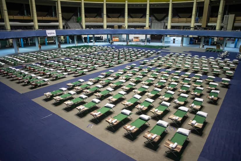 Sala Titulescu ROMEXPO emergency lodging configuration, large-scale convention center layout.
