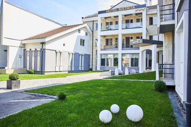 Modern Conference Room 3 at Hotel Bistrita with outdoor courtyard for business events and meetings.