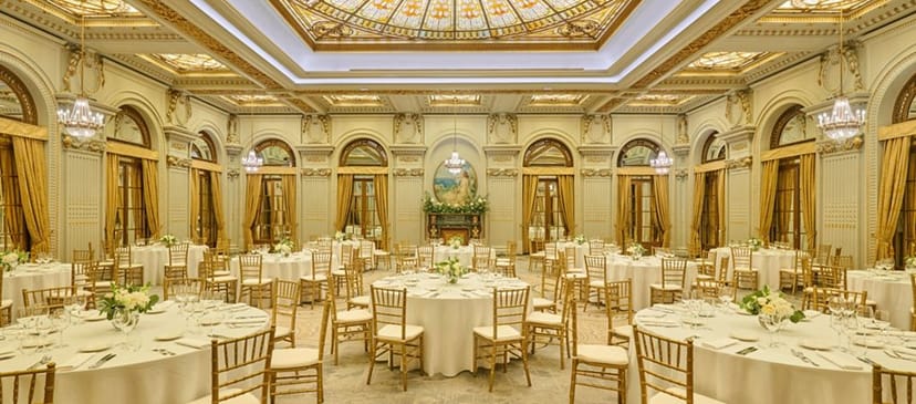 Elegant ballroom at Hotel Tineretului Bucharest with gold Chiavari chairs for weddings and galas.