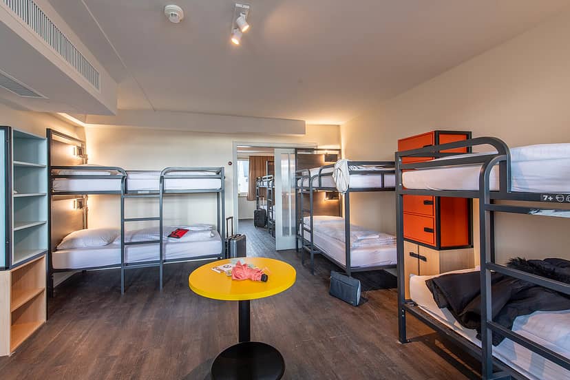Meininger Hotel Munich dorm room for budget student group travel and event accommodation.