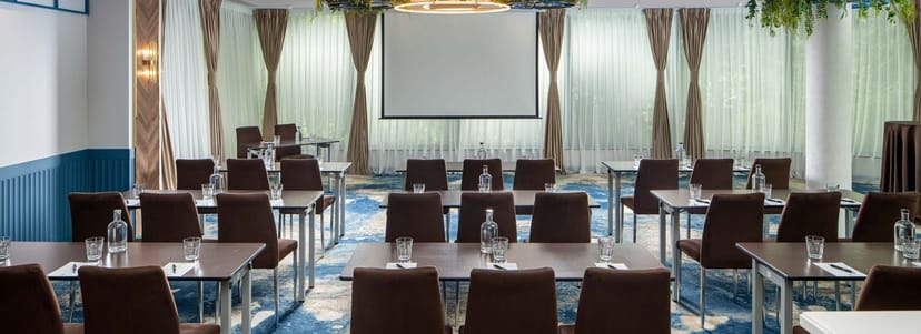 Event Hall at Epoque Hotel, well-organized for professional meetings and events.