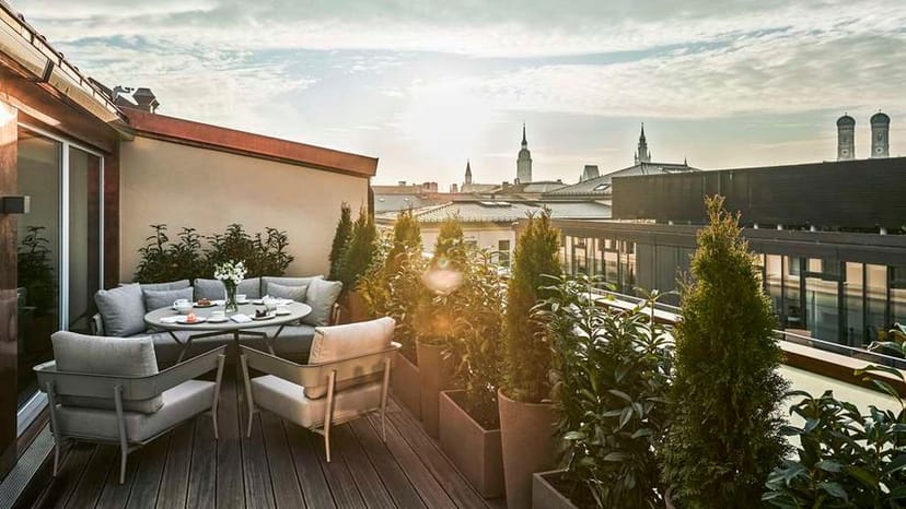 Rooftop terrace at Hotel Vier Jahreszeiten Munich, perfect for cocktail events and gatherings.