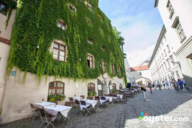 Ivy-covered Platzl Hotel venue for relaxed outdoor meetings and networking events.