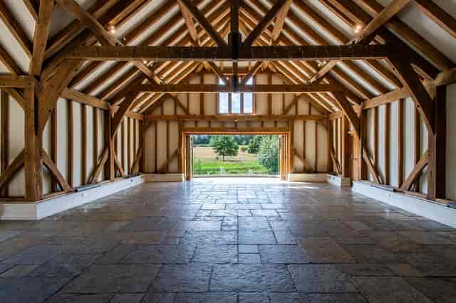 Spacious Brookfield Barn venue with rustic beams, ideal for weddings and retreats.