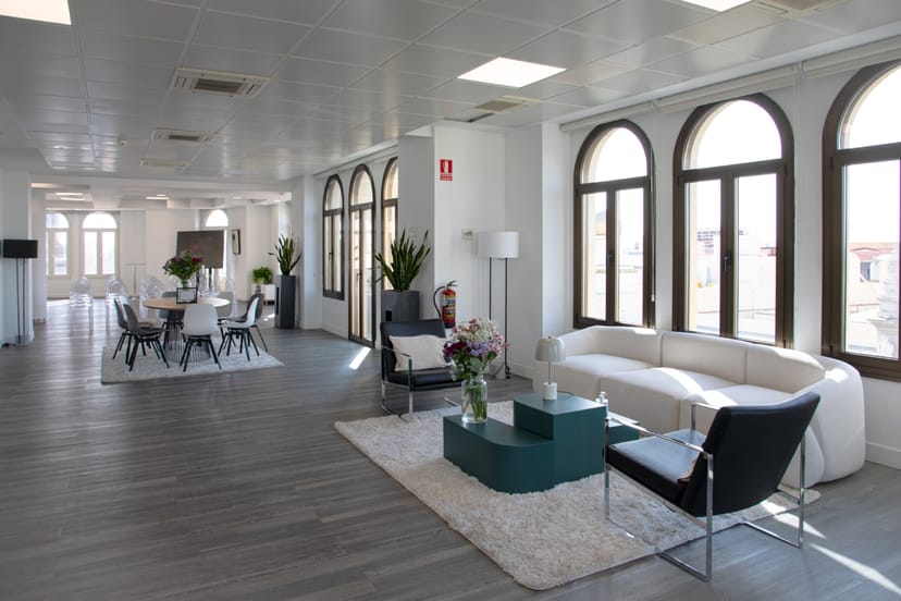 Modern breakout space with professional meeting setup for corporate events and business networking.