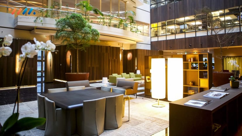 Executive boardroom at Atrium Meeting Centre with biophilic design for corporate conferences.