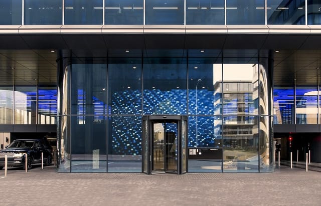 Modern office lobby entrance at Flow Houthavens for corporate site visits and executive meetings.