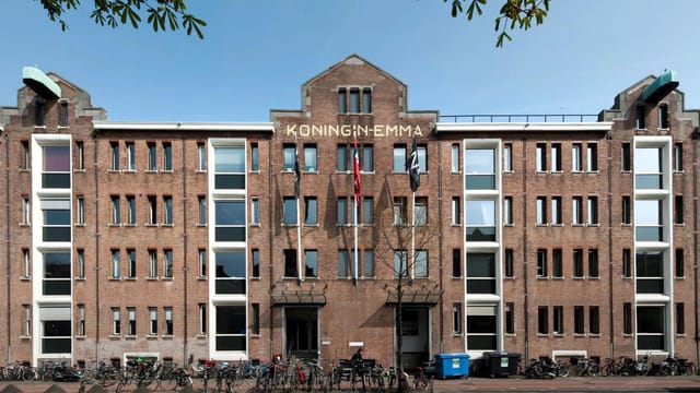 Industrial-chic HNK Amsterdam office for creative offsite or boutique conference venue.