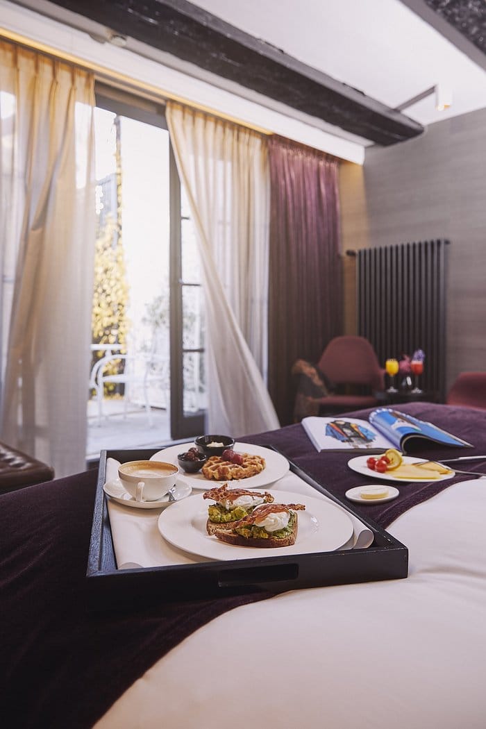 Luxury in-room dining setup at Canal House for VIP guest amenities and executive retreats.
