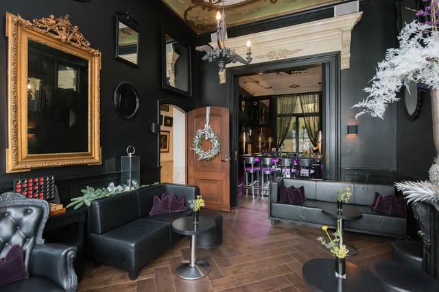 Luxury lounge bar with plush leather seating for VIP receptions and exclusive cocktail events.
