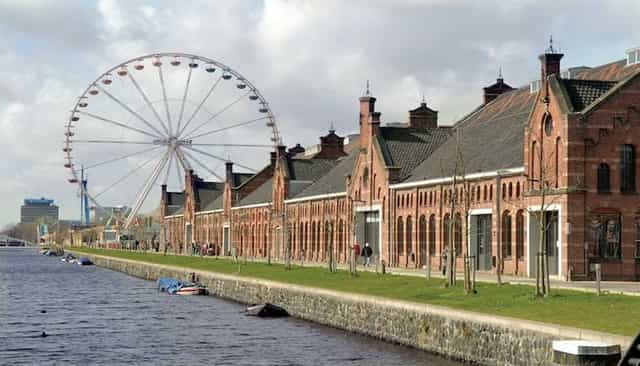 Westerpark waterfront campus with industrial architecture for festivals and corporate events.