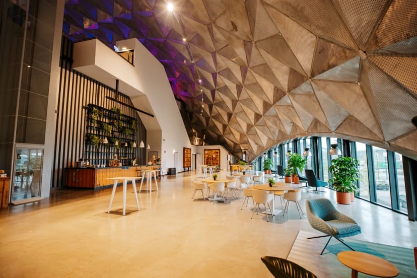 Modern Circa Amsterdam event space with architectural geometry for networking and registrations.
