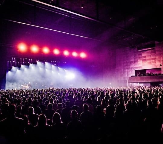 AFAS Live concert hall with atmospheric lighting for large-scale music events and festivals.