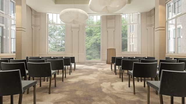 J.B. Springer Salon meeting space with floor-to-ceiling windows for corporate events and workshops.