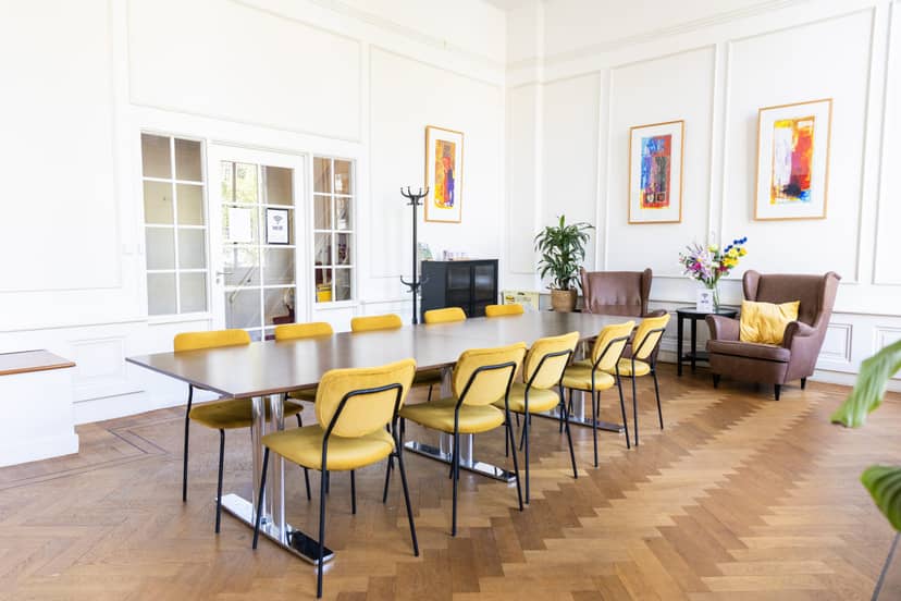 Minimalist boardroom setup in Poelmann Meeting Rooms for intimate breakout sessions.