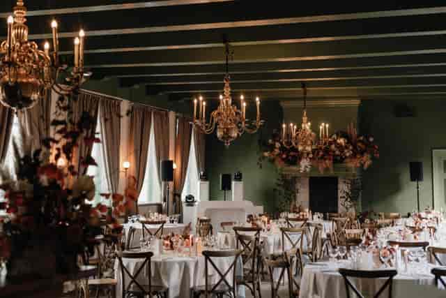 Brasserie Stuyvesant banquet hall with botanical fireplace for wedding reception and event venue.