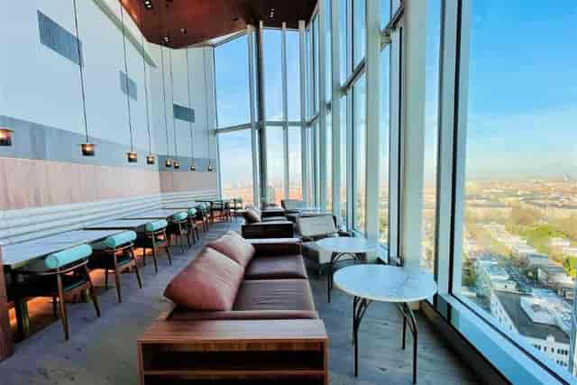 Wind Sky Bar with floor-to-ceiling city views, ideal for VIP receptions and networking events.