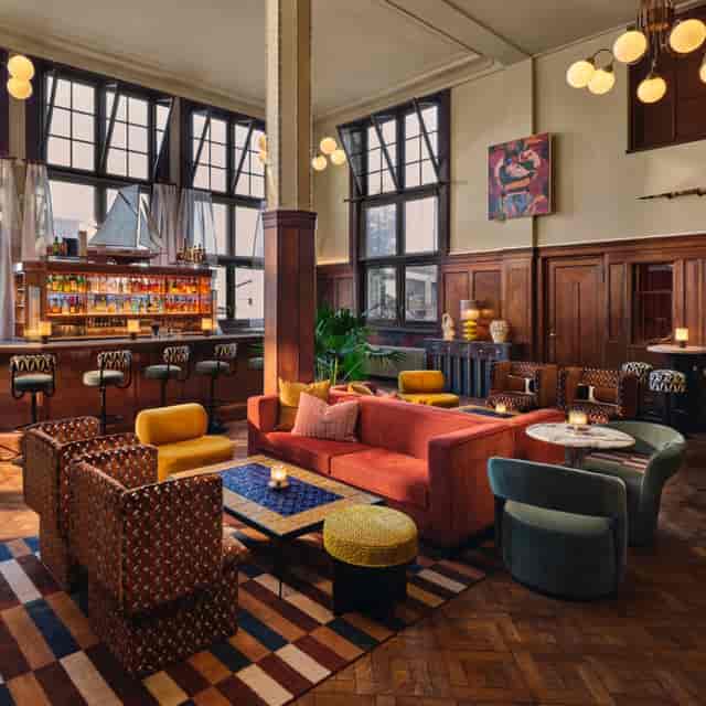 Salotto at The Hoxton Amsterdam: intimate lounge seating for networking receptions and mixers.