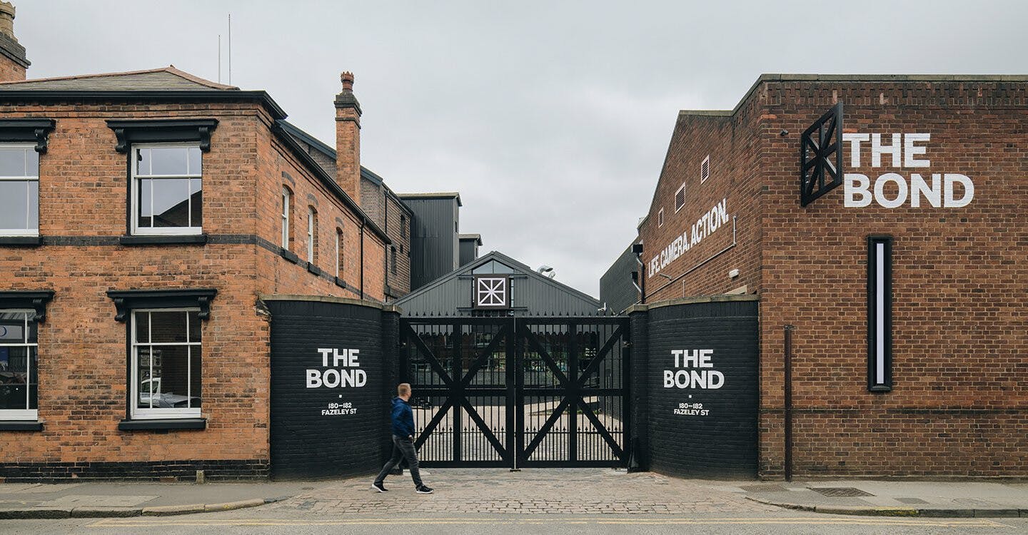 Meeting Rooms at The Bond: industrial brick entrance, ideal for corporate events and gatherings.