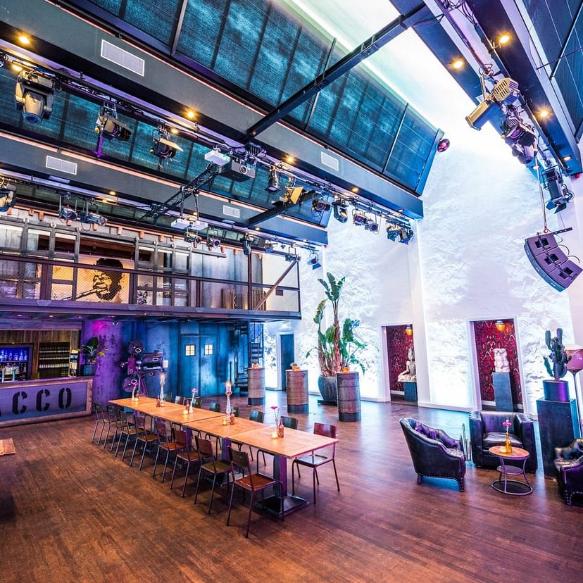 Industrial TOBACCO Theater stage with lighting for evening receptions and product launches.