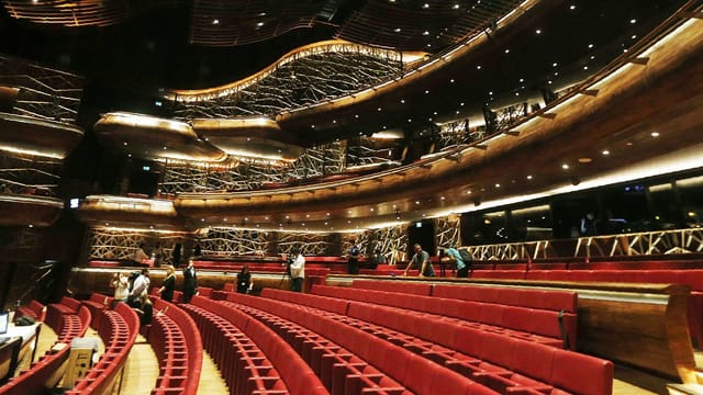 Tiered auditorium in Dubai Internet City for keynote presentations and award ceremonies.