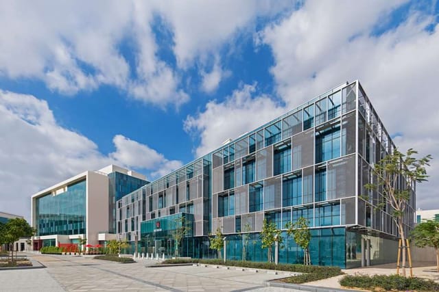 Modern meeting room with glass frontage for corporate events and professional conferences.