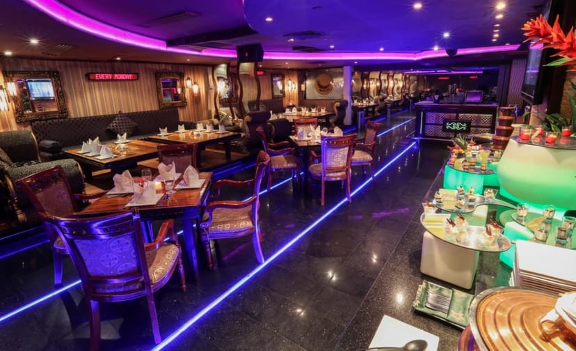 Ramee Royal Hotel suite with ambient LED lighting for corporate events and gala dinners.