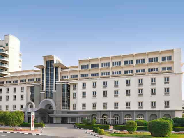Mövenpick Bur Dubai hotel porte-cochère for corporate events and luxury group arrival logistics.