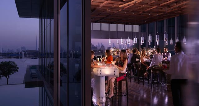 High-end rooftop venue with city skyline for executive receptions and VIP networking events.