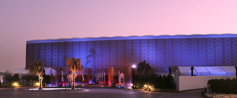Outdoor gala venue at Festival Arena Dubai with elegant architectural lighting.