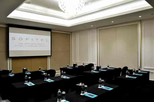Classroom-style boardroom at Sofitel Dubai Jumeirah Beach for professional corporate meetings.