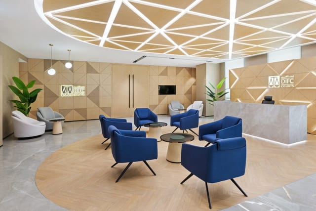 DIFC luxury courtroom rental with tiered lounge seating for VIP corporate events and networking.