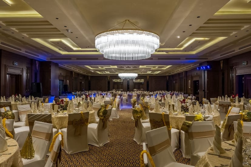 Lalique Ballroom with gold-accented chandeliers, ideal for luxury galas and formal corporate events.