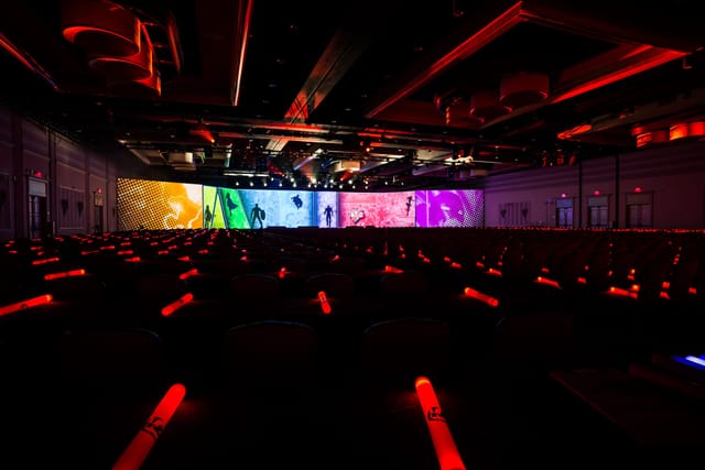 Encore Dubai general session with wide-format LED backdrop for corporate events and conferences.