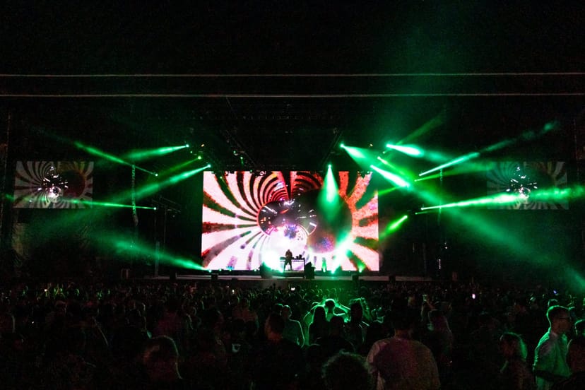 Encore Dubai outdoor concert with LED stage backdrop for high-energy music festival event.