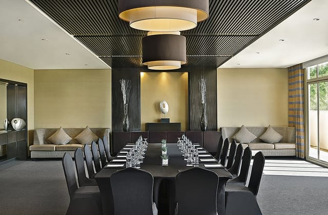 BAHU Terrace boardroom setup with sleek executive table for corporate meetings and VIP events.