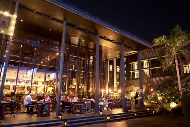 Grapeskin wine bar with ambient lighting, perfect for executive networking and evening receptions.