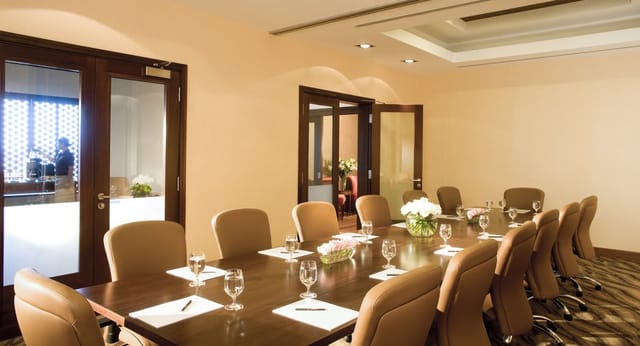 Turnkey boardroom at La Ville Hotel for executive meetings and corporate events.