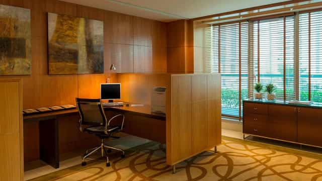 Executive workstation at Four Points by Sheraton Dubai for corporate event planning and VIP prep.