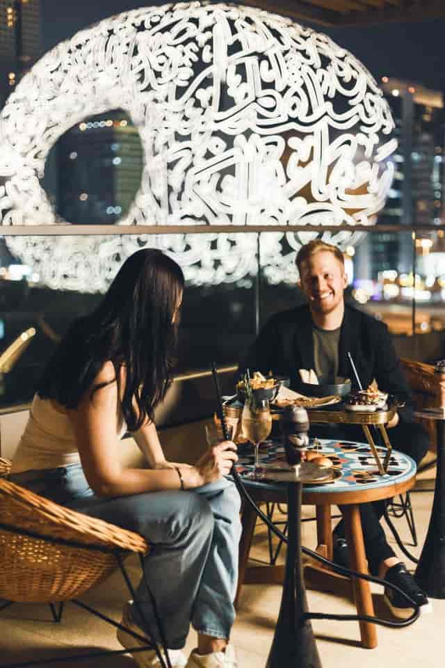 VIP shisha experience at 25hours Hotel rooftop for exclusive corporate events and luxury dinners.