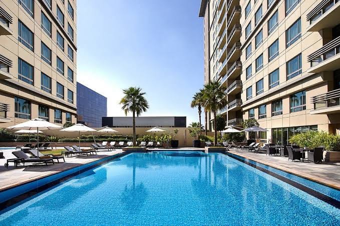 High-end poolside venue at Swissotel Al Ghurair for cocktail receptions and networking events.