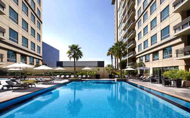 Swissôtel Al Ghurair outdoor pool deck for corporate receptions and networking events.