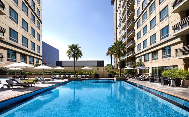 Swissôtel Al Ghurair outdoor pool deck for corporate receptions and networking events.
