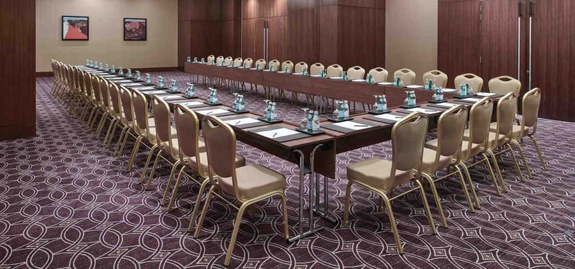 U-shaped meeting room at Swissôtel Al Ghurair, ideal for corporate workshops and conferences.