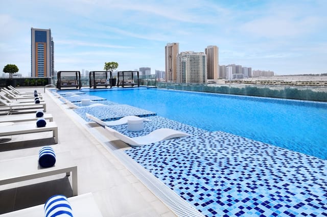 Al Fursan rooftop venue with infinity pool for upscale corporate events and cocktail receptions.