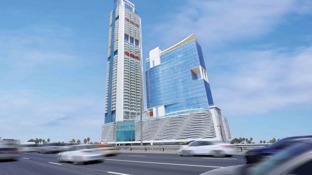 Mövenpick Jumeirah Village Triangle high-rise, ideal for luxury corporate conferences and events.