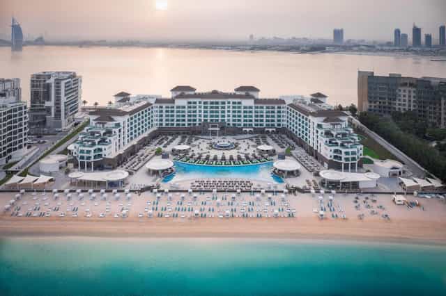Aqua at Taj Exotica: Beachfront pool deck for corporate incentive travel and networking events.