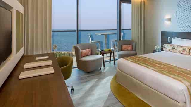 VIP luxury suite with private balcony for executive travel and corporate events.