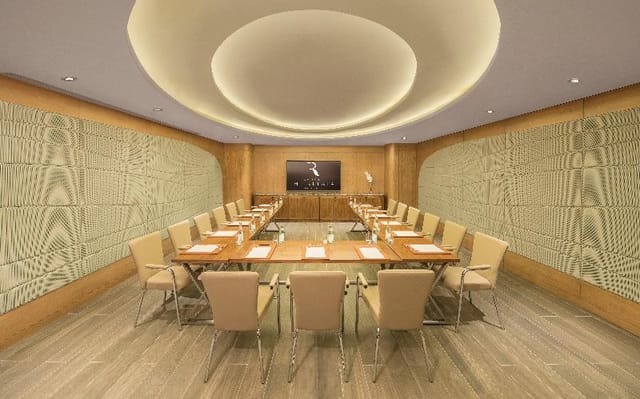 U-shape boardroom at The Retreat Palm Dubai, modern executive meeting space for corporate events.